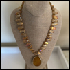VISIONS OF THE SUN ON A NEW FAY -- Artist: Phyllis Wiggins-Horne Size: 18" Medium: Fiber, Jewellry/Wearable Art Price: $150.00