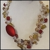 RADIANT FALL GEMS -- Artist: Phyllis Wiggins-Horne Size: 16" Medium: Fiber, Jewellry/Wearable Art Price: $225.00