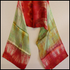 GREEN AND RED SCARF BY CHRISTIAN TSHIBANDA -- Artist: Folly Theater Size: 13" x 69" Medium: Fiber, Jewellry/Wearable Art Price: $60.00