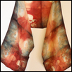 RUST AND INDIGO SCARF BY THOMAS RECKER -- Artist: Folly Theater Size: 13" x 64" Medium: Fiber, Jewellry/Wearable Art Price: $60.00