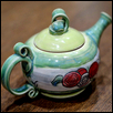 SPRING TEAPOT -- Artist: Wanda Henton Jackson Size: 6"x 10" x 5.5" Medium: Ceramic Price: $226.00