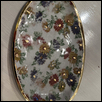 FLOWER FIELD -- Artist: Rachel Benbrook Size: 6" x 2" Medium: Ceramic Price: $50.00